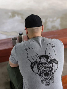 A Navy defence member wearing Odin in a grey undershirt